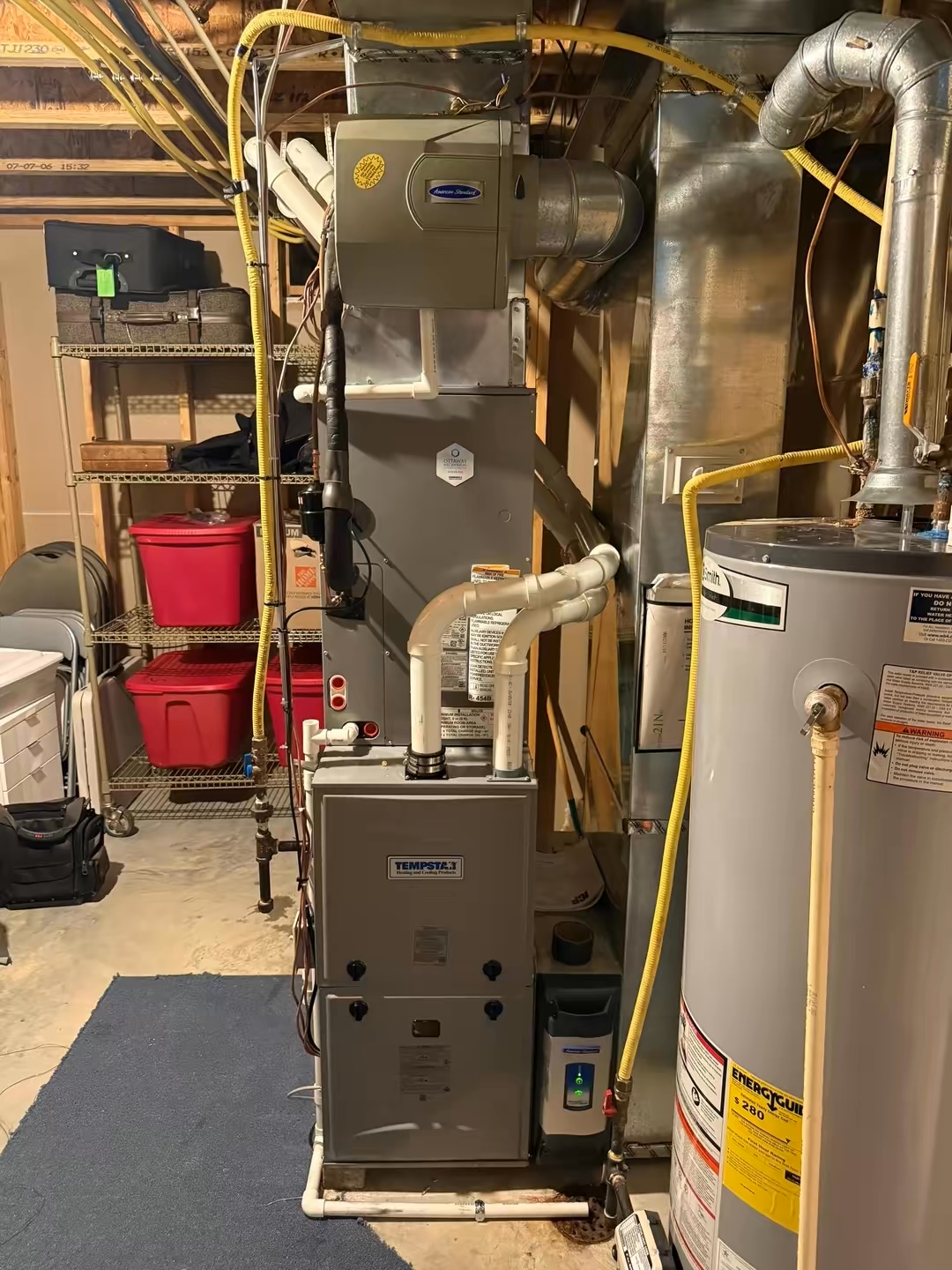 Tempstar gas furnace installed with new venting, drain piping and duct connections